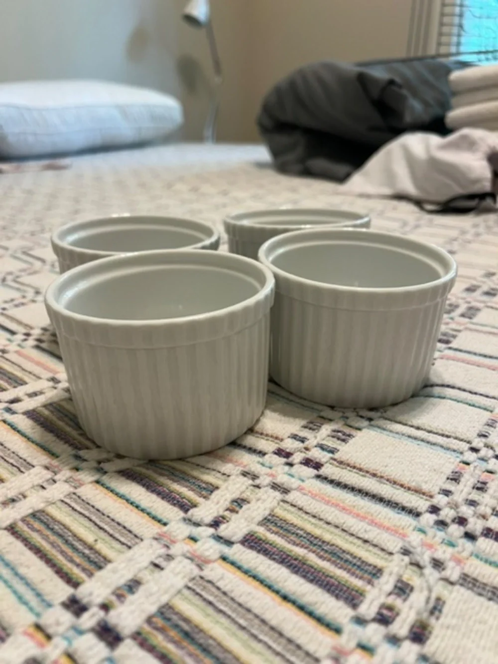 Set of four white Crate & Barrel Ramekins